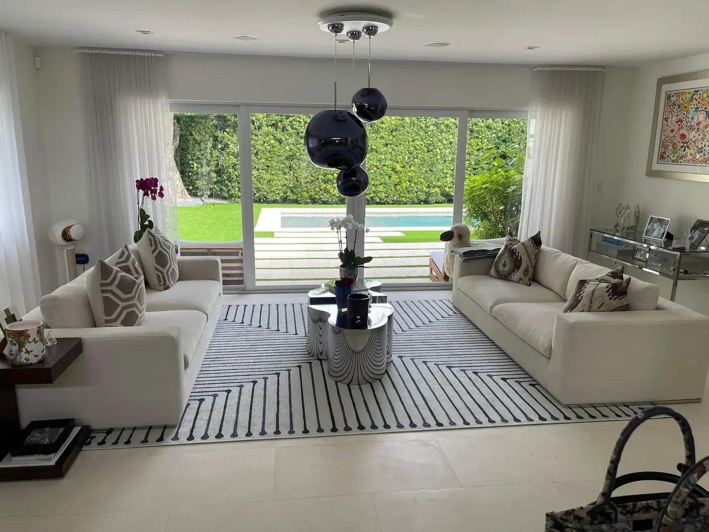 Bright living room with custom sheer draperies