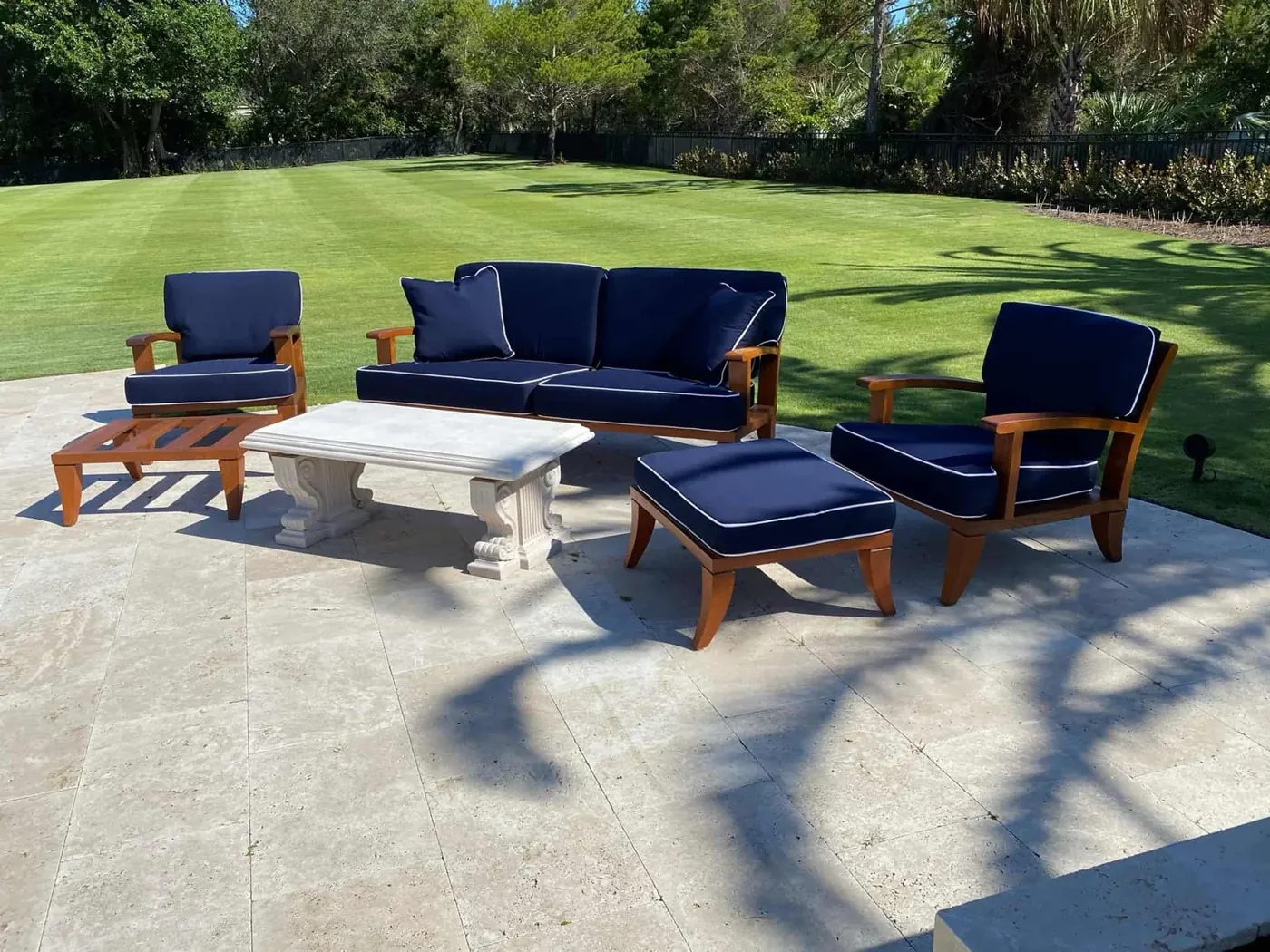 Patio furniture with custom navy outdoor cushions