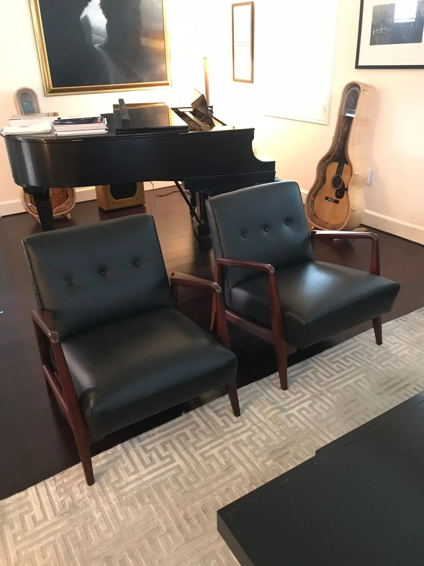 Leather lounge chairs reupholstered for a music room