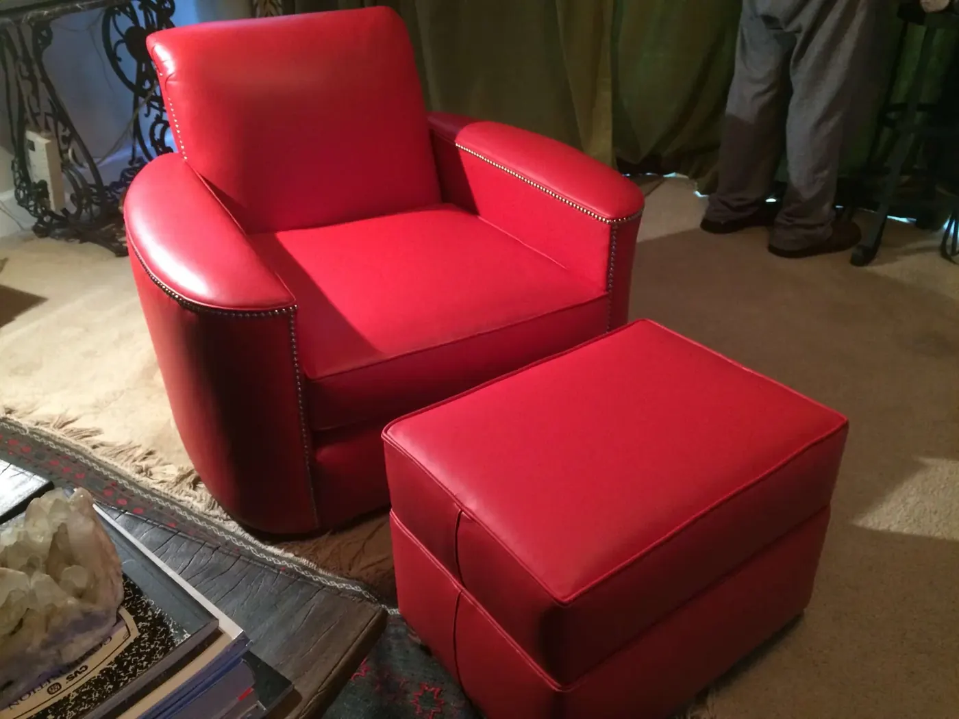 Red leather armchair and ottoman